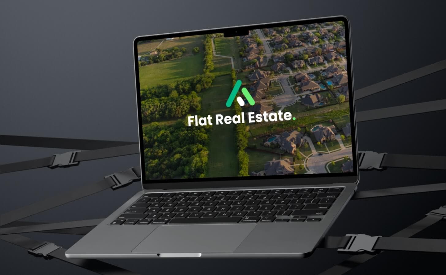 Flat Real Estate logo on a laptop over an aerial photo of houses, brand identity by Donika Bajrami.