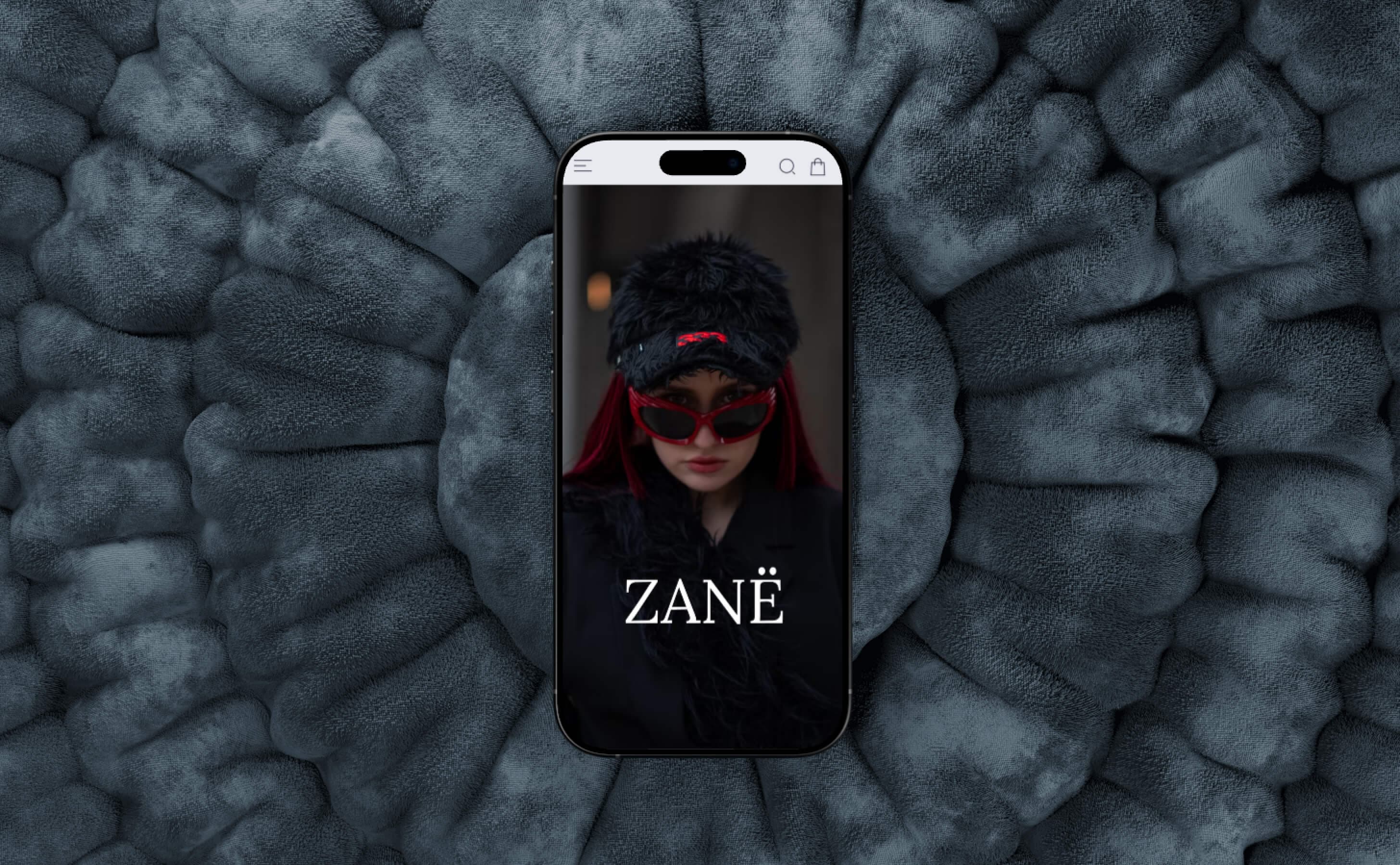 Zanë cover artwork shown on a phone against a dark textured background, by Donika Bajrami.